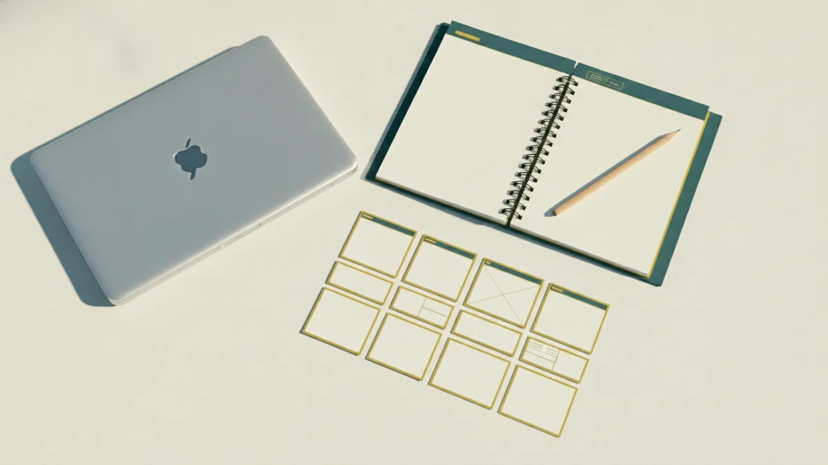Planning a custom page layout Laptop and notebook arranged for assigning a custom page layout during site work
