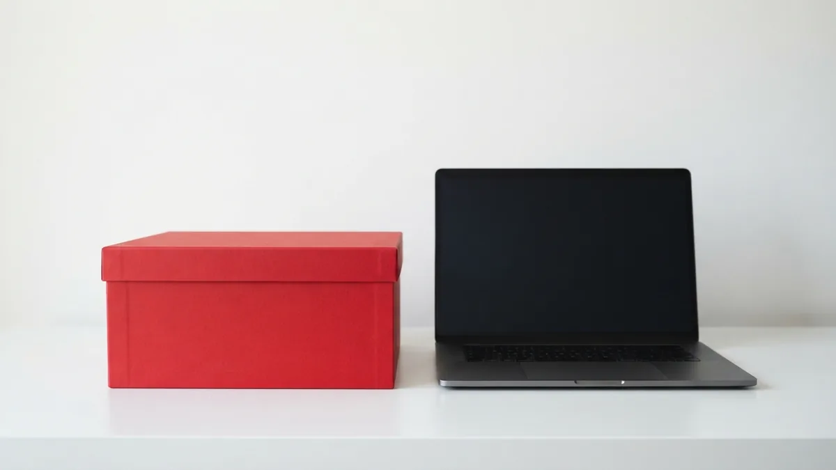 Crimson storage box beside a closed laptop, suggesting a secure WordPress login routine