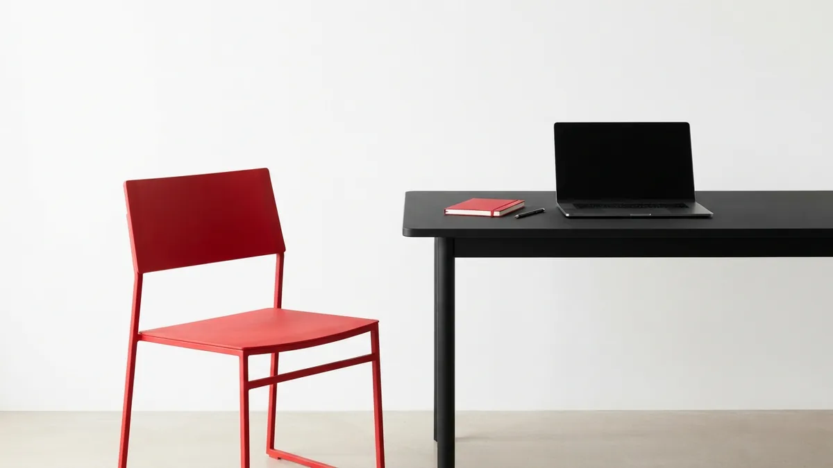 A quiet space for testing a local site Minimal red chair beside a graphite desk for testing a local WordPress site