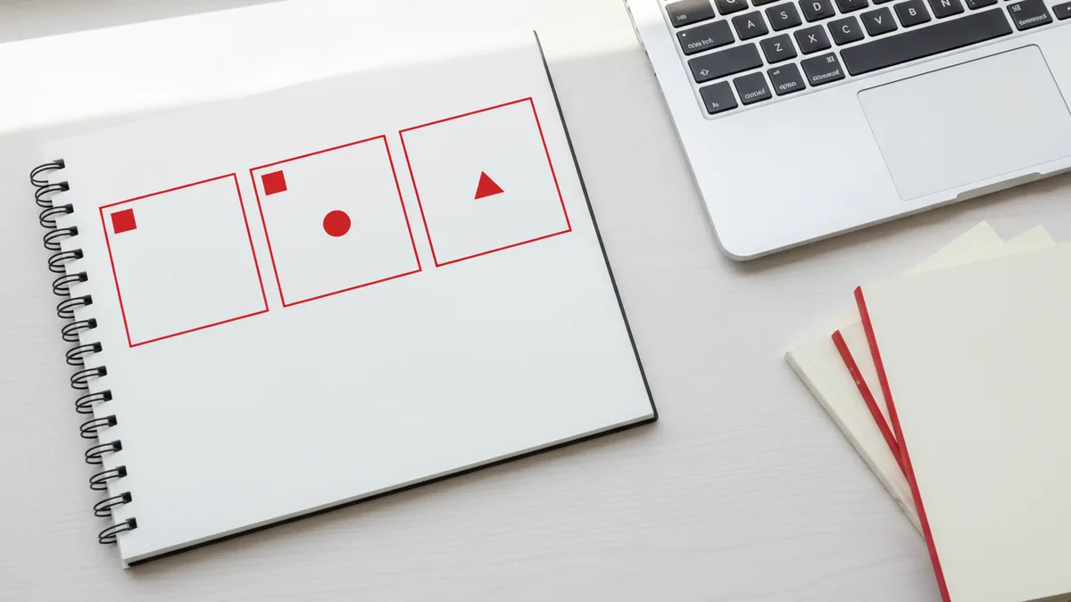 Choose your web design path Choosing a learning path with a planner and notes near a laptop