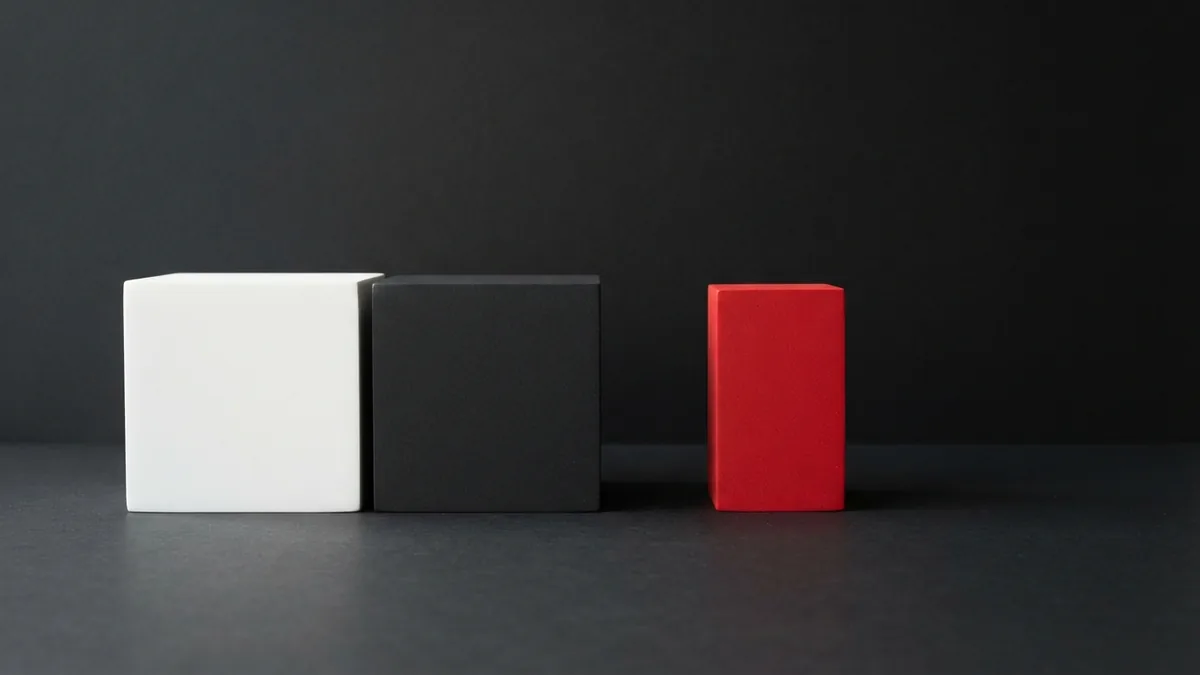 Spotting update compatibility issues Crimson block beside balanced white and graphite forms representing a software mismatch